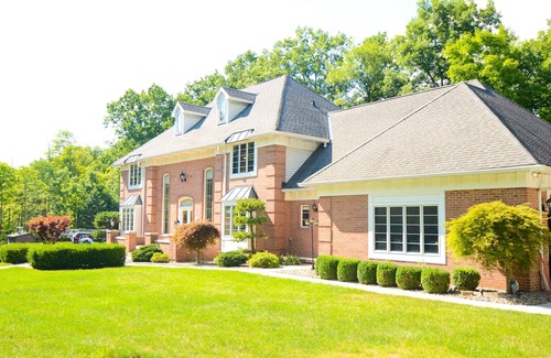 Hudson Villa | Spacious mansion with Pool Movie Theater Hot Tub near ski resort national park.