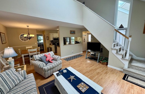 Brewster Condo | Spacious, renovated and beautifully decorated Howland Village townhouse with straight staircase