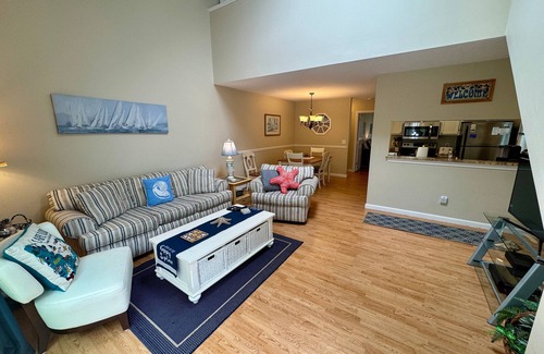 Brewster Condo | Spacious, renovated and beautifully decorated Howland Village townhouse with straight staircase