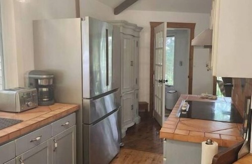 Haliburton House | Spacious, waterfront home surrounded by trees with large dock & games room.