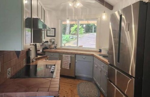 Haliburton House | Spacious, waterfront home surrounded by trees with large dock & games room.