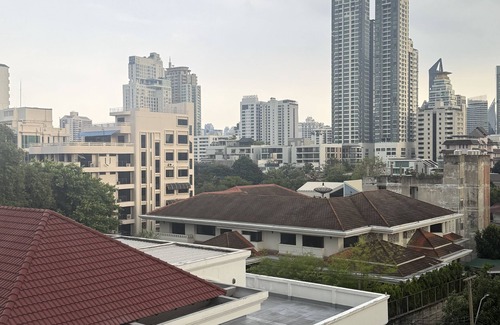 Asoke Apartment | Spanish inspired, 1-bedroom, rooftop apartment in phenomenal Bangkok with AC