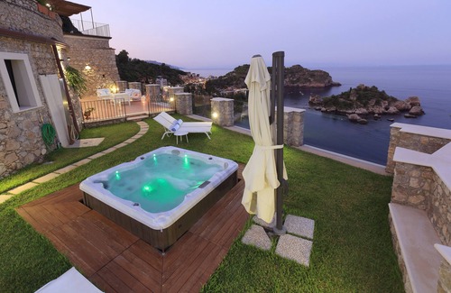 Mazzaro Apartment | Sparrowhawk Isolabella Suite. Suite with a view of Isolabella Bay