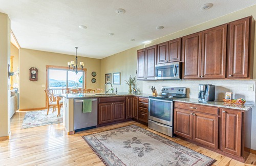 Dayton House | Spectacular lake-view retreat with deck, grill, free WiFi, W/D, & island views
