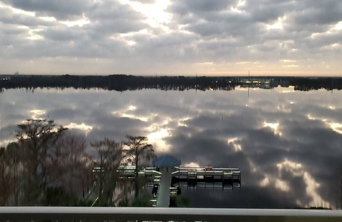 Florida Central Atlantic Coast Condo | Spectacular Lakefront Condo at Disney's Doorstep - just 1 mi. to Disney Springs!