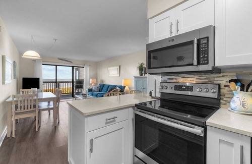 Duck Condo | Spectacular ocean views from two private balconies with cheerful decor close to town of Duck