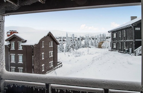 Trysil Apartment | Spend a relaxing vacation in this beautiful and comfortable apartment with mountain view.