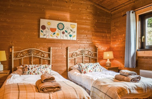 Exebridge Cottage | Spend time with loved ones at Heron Lodge, with picturesque views and wonderful accommodation, you w