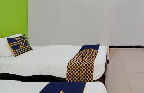 Pekanbaru Hotel | SPOT ON 92255 Lucky Guesthouse
