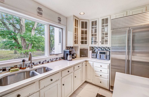 Hampton Bays House | Sprawling sun-lit home with private heated pool, arcade, air hockey, & grill