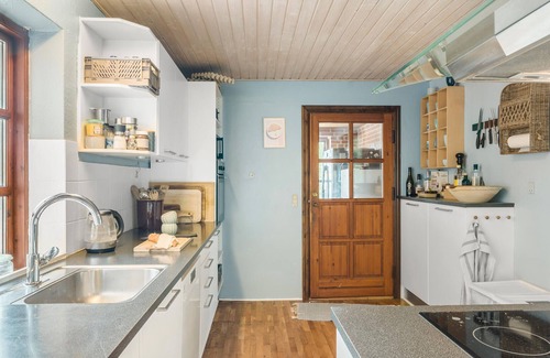 Farso House | Stay by the Limfjord in this large and very well-equipped holiday home.