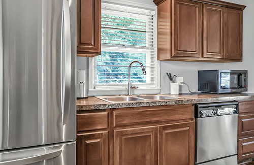 Omaha House | Stay in a charming 2-bedroom house in Omaha with WiFi, AC, and a peaceful vibe.