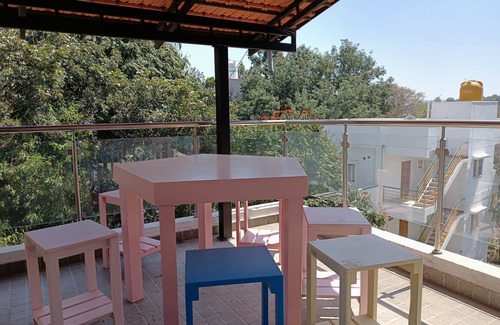 Sathya Sai Layout House | STAYCATION: A cozy room in a Bnb surrounded by lush greenery