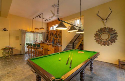 Hoshiarpur Villa | StayVista at Peacocks & Partridges with Amidst Greenery, Terrace, Indoor Fireplace, Bar & Snooker Table