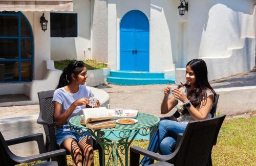Karjat Villa | StayVista's Casa Blanca - Modern elegance with a pool, spacious lawn & diverse activities