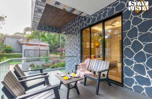 Kune Village Villa | StayVista's Greystone Estate with Pool, Theater, Terrace, and Snooker Table