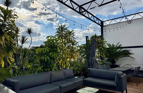Doctores House | Step into a beautifully preserved historic home in the heart of Roma Norte — one of Mexico City’s most iconic neighborhoods. This 8-bedroom residence blends original charm with modern comfort, featuring private bathrooms, a charming rooftop.