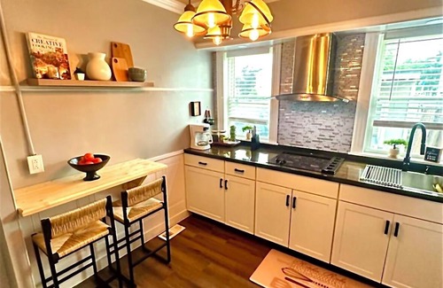 Pawtucket Apartment | Step into a serene stay where electric charm meets cozy coastal tranquility.