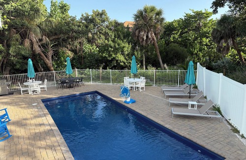 Jose's Hideaway House | Steps from the beach! Spacious island retreat with pool, grill, and space for 12