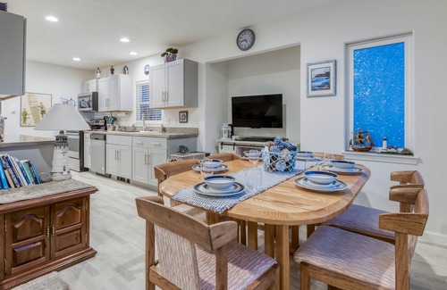 Nelscott House | Steps to the beach, ocean view, deck, BBQ, pet friendly with a fenced in yard