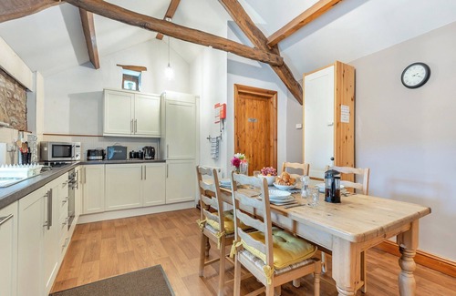 Alston Cottage | Stone built barn conversion with cosy living spaces and stunning fell views.