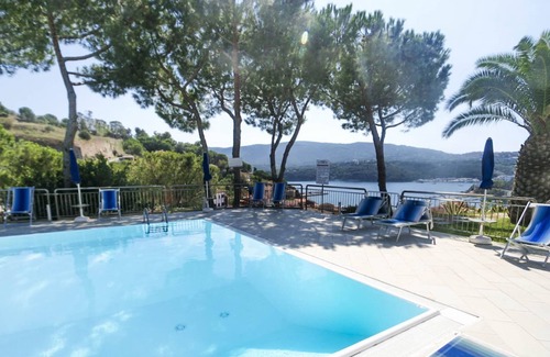 Porto Azzurro Apartment | Studio 4 with sea view pool in a panoramic position above the village of Porto Azzurro