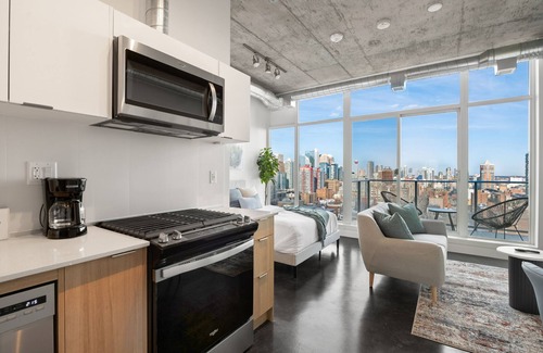 Connaught Apartment | Studio Just Steps from Stampede Park: Luxury Living