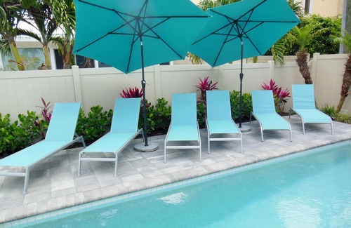 Deerfield Beach House | Stunning 3/3, Heated Pool, Tropical Setting. 5 Star Rated Best on the Island!