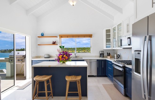 The Valley Villa | Stunning 6 bedroom waterfront villa with wooden dock