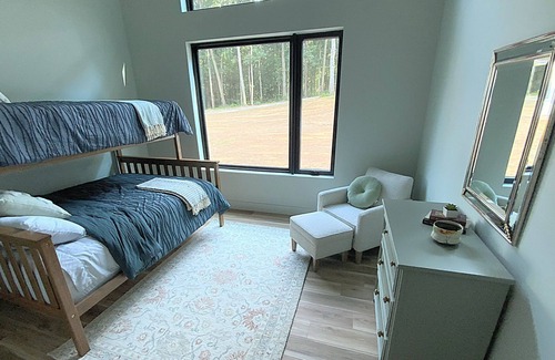 Dewy Rose House | Stunning contemporary home in the woods; sauna, screened porch, soaring ceilings