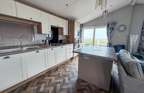 Hopton Cabin | Stunning lodge with full sea views and decking at Broadland Sands ref 20076CF
