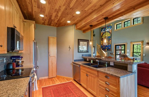 Coeur d'Alene House | Stunning mountain escape with lake views, expansive furnished deck & firepit - dog-friendly