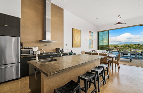 Lihue Apartment | Stunning Oceanfront Penthouse, 14' ft Ceilings and Wall-to-Wall Glass Slider.