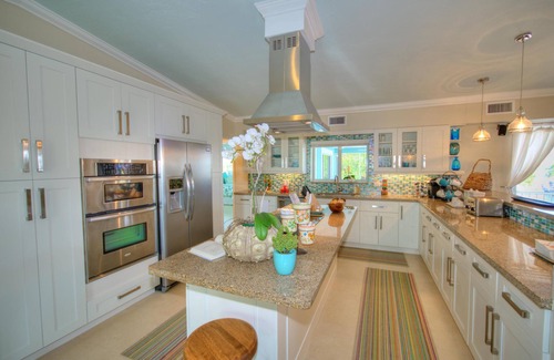 Anglers Park House | Stunning Three Level House on Key Largo Canal with a heated pool and roof deck.