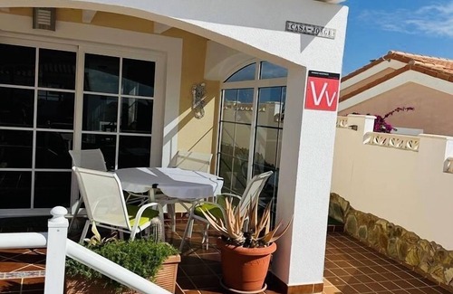 Caleta de Fuste Villa | STUNNING VILLA WITH HOT TUB, 10 MINS WALK TO THE BEACH,WITH COMMUNAL POOL.