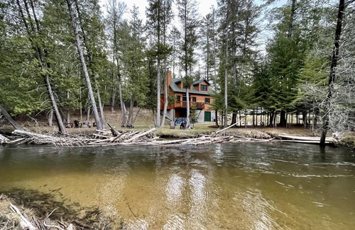 Cheboygan County Cabin | Sturgeon Riverfront Cedar Cabin