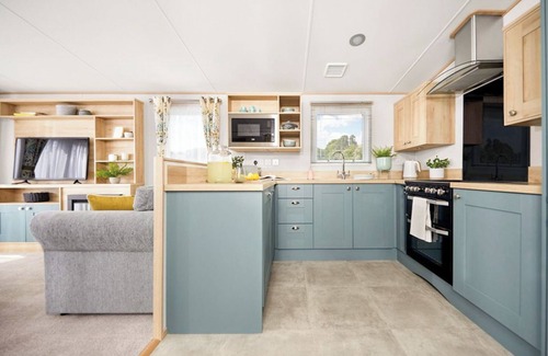 Aberystwyth House | Stylish and modern caravan with one double and one twin.