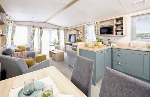 Aberystwyth House | Stylish and modern caravan with one double and two twin.