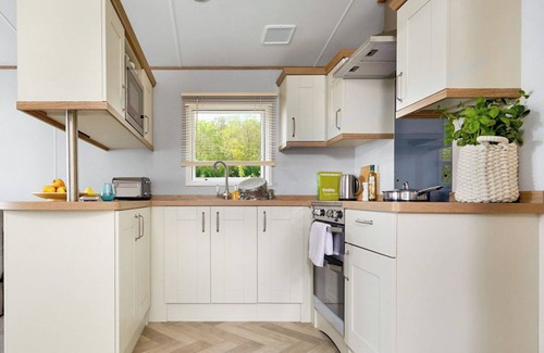 Aberystwyth House | Stylish and modern caravan with one double and two twin.