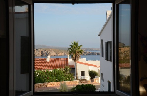 Arenal d'en Castell Apartment | Stylish apartment with sea views - 5 min walk to the beach!