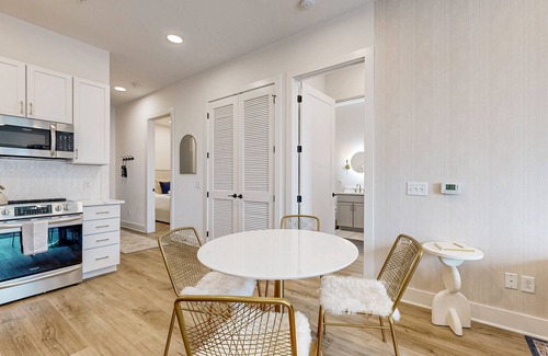 East Nashville Condo | Stylish condo with balcony, high speed internet, W/D and elevator