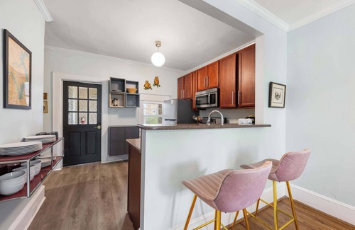 Dilworth Condo | Stylish Dilworth 2BR King Condo | Porch | Walkable