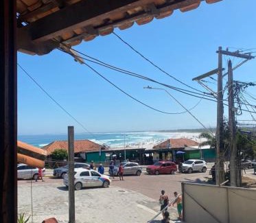 Praia Grande Hotel | Suites e Quartos Em frente a Praia Grande -Na orla Flavia Alessandra
