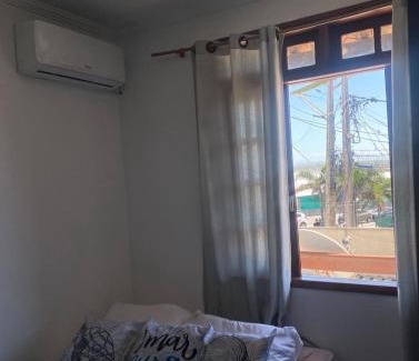 Praia Grande Hotel | Suites e Quartos Em frente a Praia Grande -Na orla Flavia Alessandra