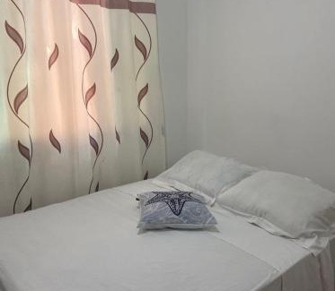Praia Grande Hotel | Suites e Quartos Em frente a Praia Grande -Na orla Flavia Alessandra