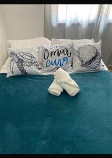 Praia Grande Hotel | Suites e Quartos Em frente a Praia Grande -Na orla Flavia Alessandra