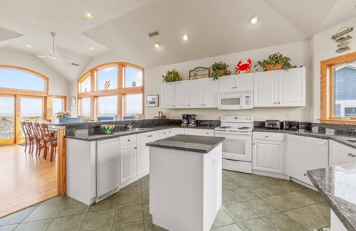 Ocean Isle Estates House | SUMMER SAVINGS - Luxurious Oceanfront Home w/Pool, Hot Tub, Elevator, Tiki Bar