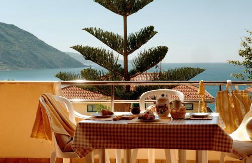 Gioiosa Marea Apartment | Sun-Filled Apartment, Breathtaking Coastal View, Gioiosa Marea, Limone by Ideal Sicily