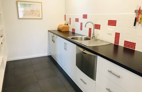 Waterhouse House | Sun on Sanders - Modern 2 br house close to main street. Pet Friendly Outside