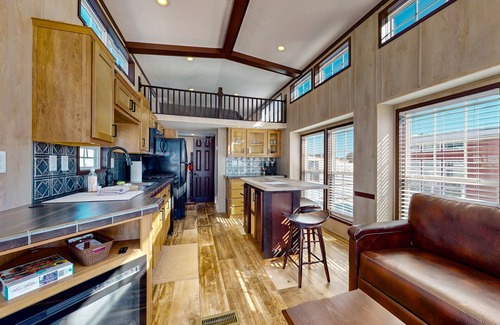 Colorado Springs Cottage | Sunlit cabin on 1,800-acre ranch with animals, mountains, games & firepit
